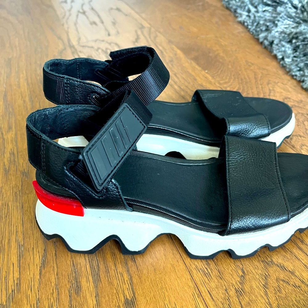 Sorel Sandals Size 37 Black ultra comfortable, Black with red & white accents.